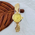 Women's stainless steel watch with round dial and Vachette clasp buckle showing gold face option