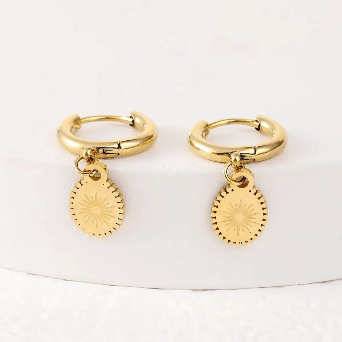 A pair of geometric stainless steel earrings with an ellipse detail, colour XY-EH005.