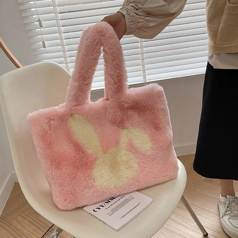 Plush shoulder bag with cartoon rabbit ears design in solid colour with large capacity