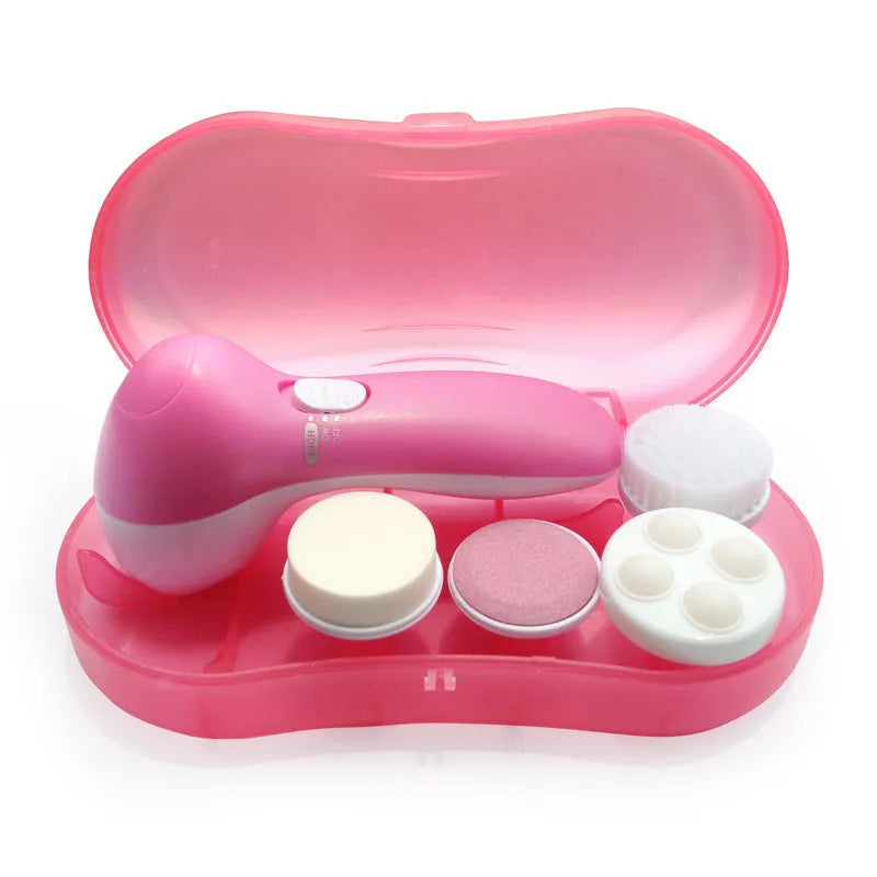 Pink electric facial cleanser with soft brush attachment and roller massager on white background, compact size