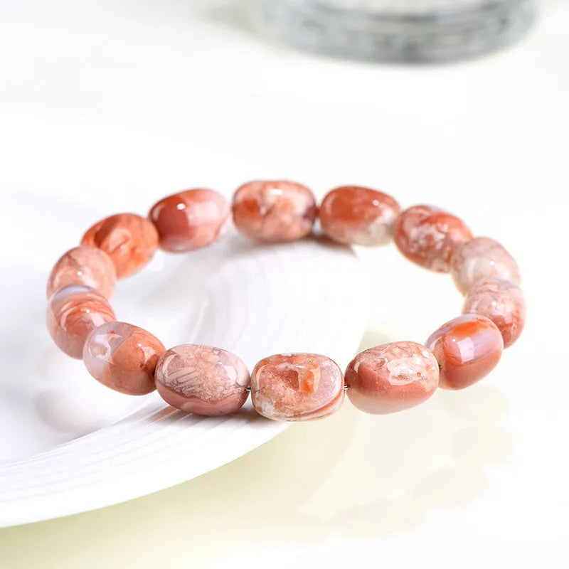Natural cherry blossom agate barrel bead bracelet with ruyi pattern design