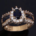 Personalised zinc alloy ring with blue diamond or coloured zircon designs in sizes 6 to 11.