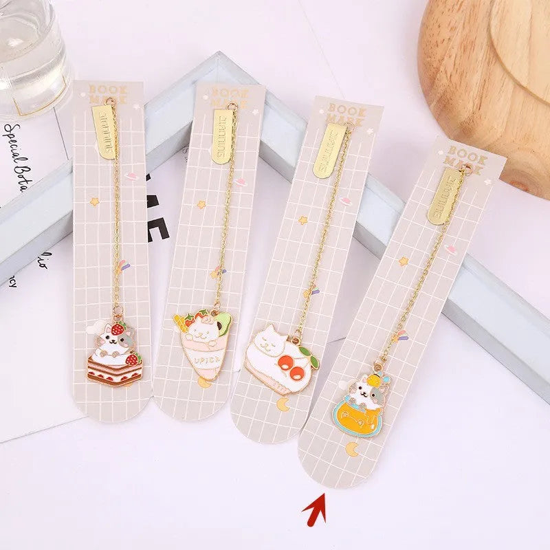 Jane Lime metal pendant cat cartoon bookmark in four colourful designs on a white background.