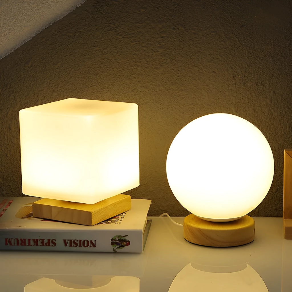Nordic solid wood USB bedside lamp with flower-shaped design in white cylinder style on wooden surface