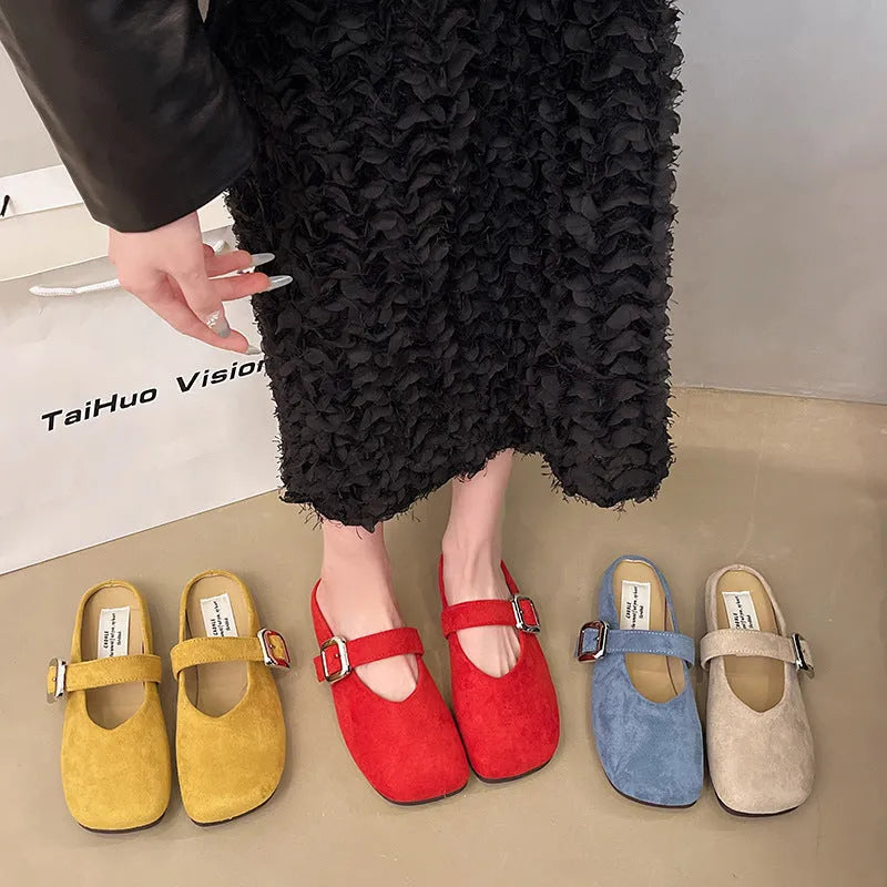 Women's flat closed toe slippers with square head in apricot, blue, red, or yellow colours on a rubber sole.
