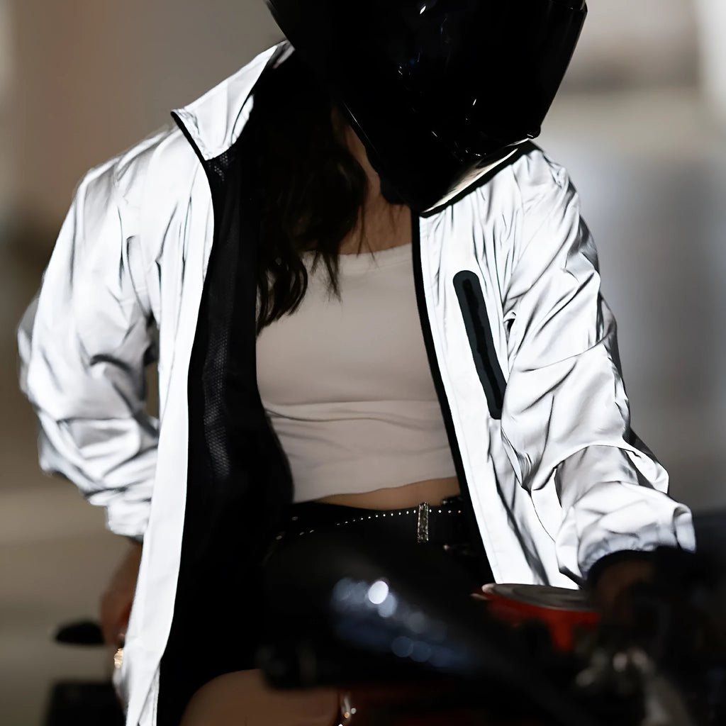 Silver waterproof polyester windproof coat with long sleeves showing Asian and European sizing labels