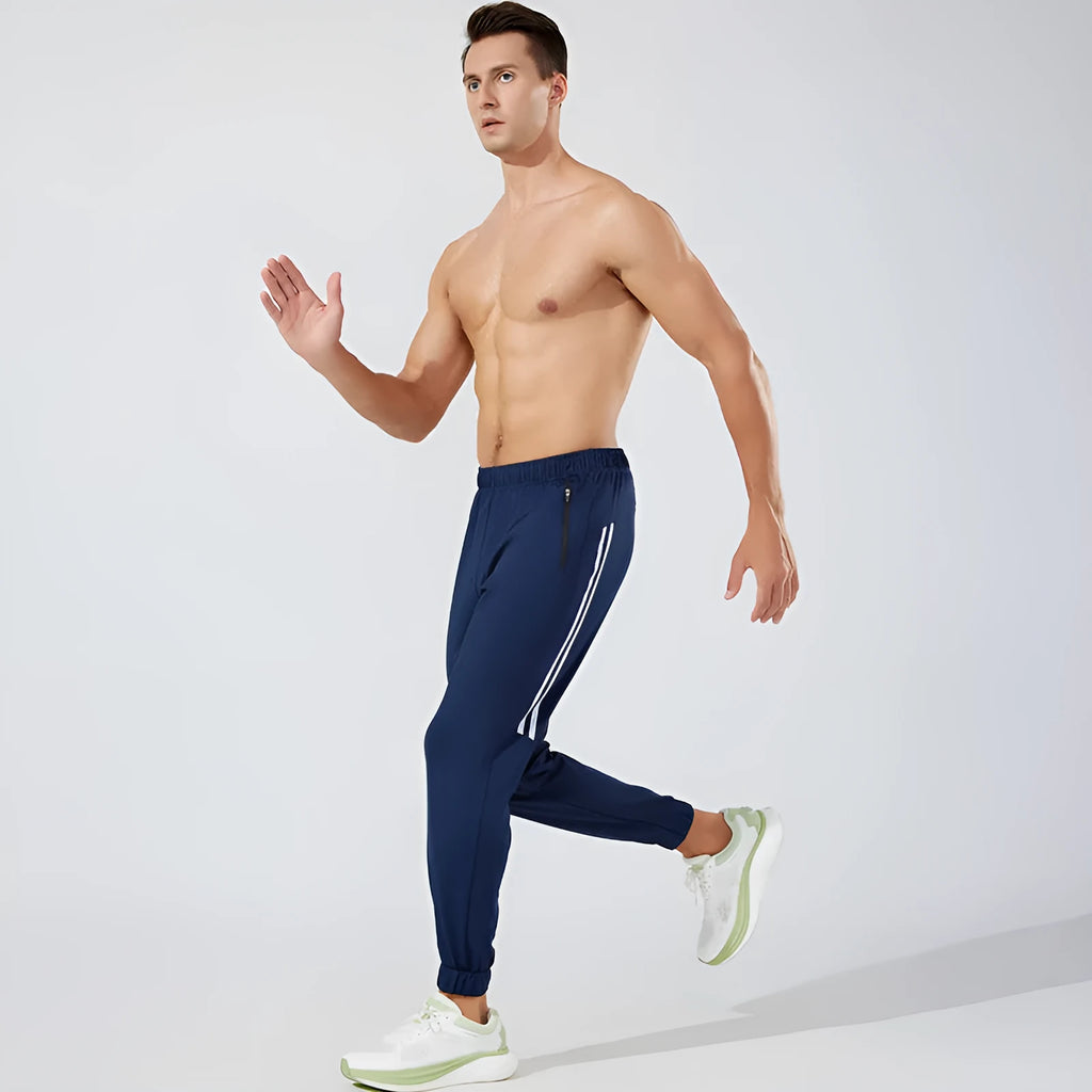 Men's black running trousers in polyester fabric with trousers-length legs for spring exercise