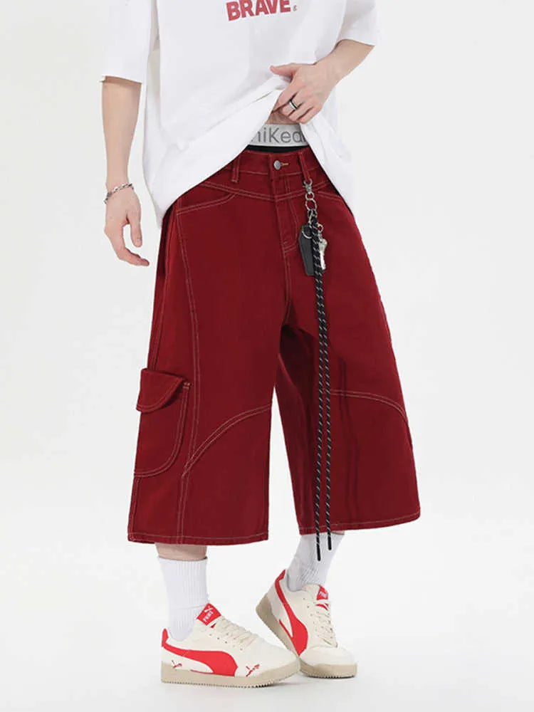 Retro denim workwear shorts with multiple pockets and wide leg design in black colour