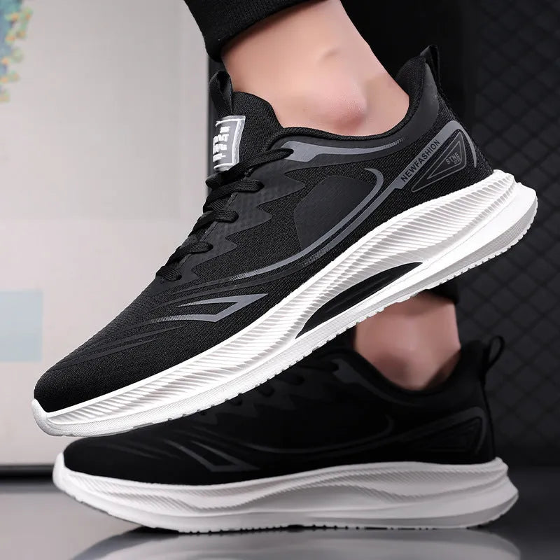 Men's low-top casual shoes in fly woven mesh, showing round toe and rubber sole, in black colourway.