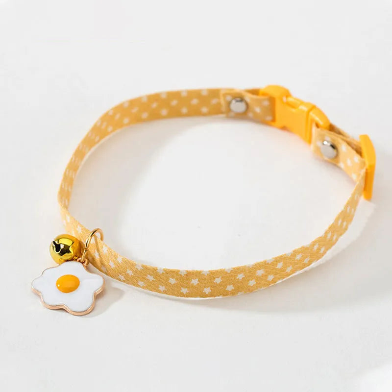 Adjustable cat collar with bell pendant and bow tie decoration for small pets in green, pink, yellow colours