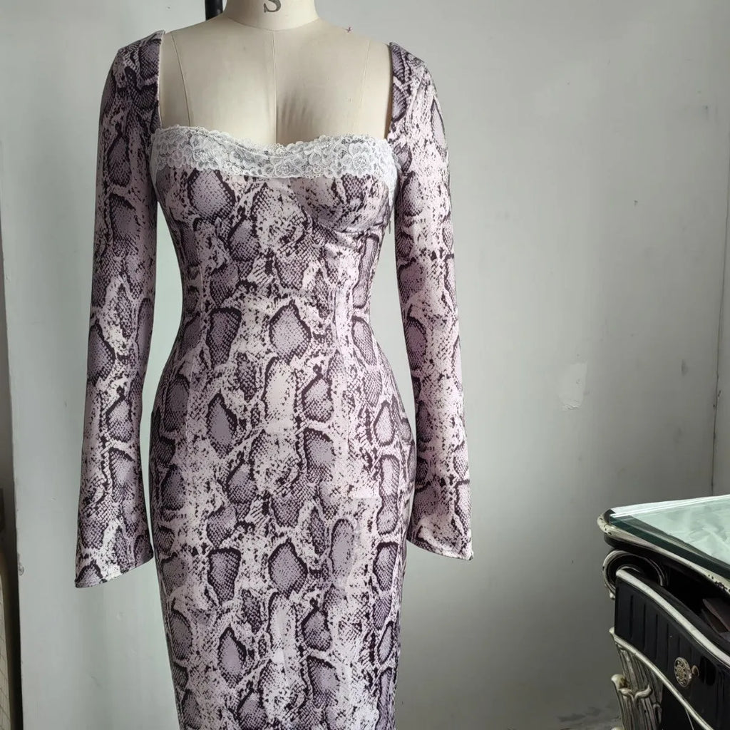 Grey slim fit lace dress with digital printed 3D pattern and long sleeves on a mannequin.