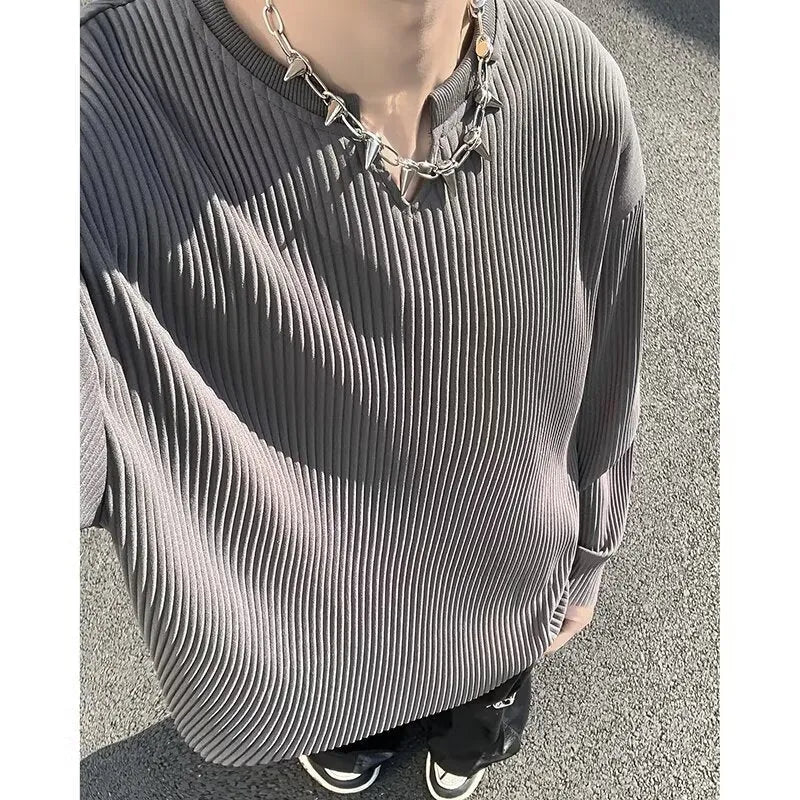 Plus size striped texture draping solid colour pullover in black, long sleeves, loose fit, front view