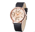 Quartz watch with analogue face, day and date window, stainless steel back, and black dial on a leather strap