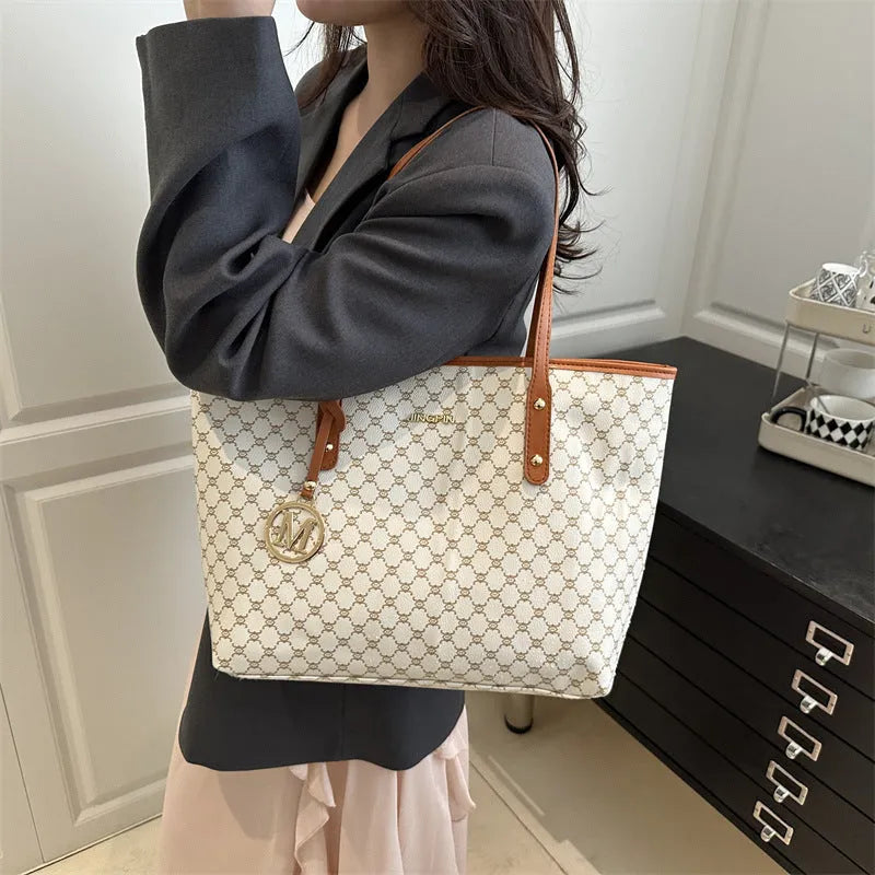 Western style black PU shoulder bag with sewing thread detailing and adjustable strap.