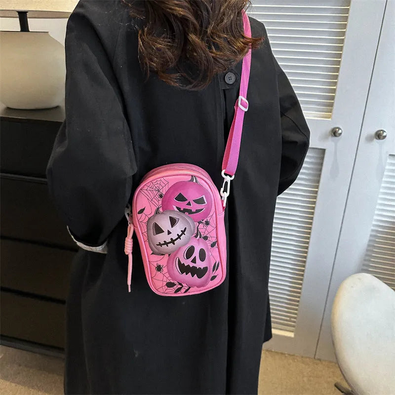 Halloween graffiti crossbody bag with pumpkin ghost bat cartoon prints in medium 14x23x9.5cm size