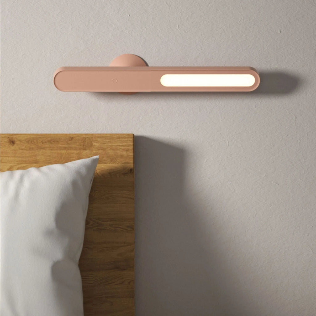 Geometric desk lamp with magnetic base shown in khaki colour with touch control