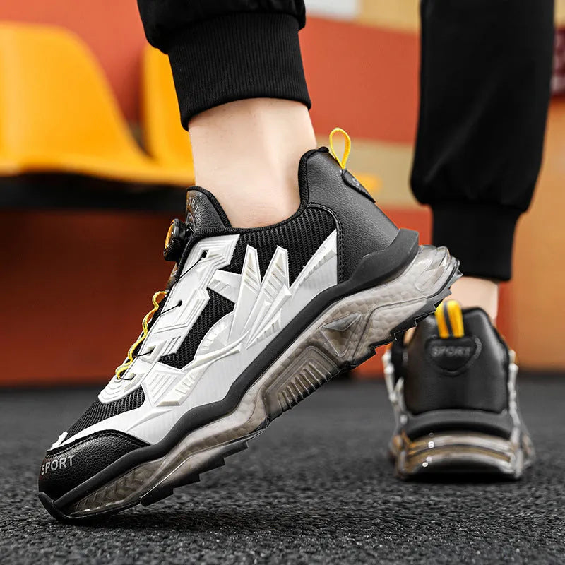 Men's black mesh casual sneakers with a rotating button closure and a low platform sole.