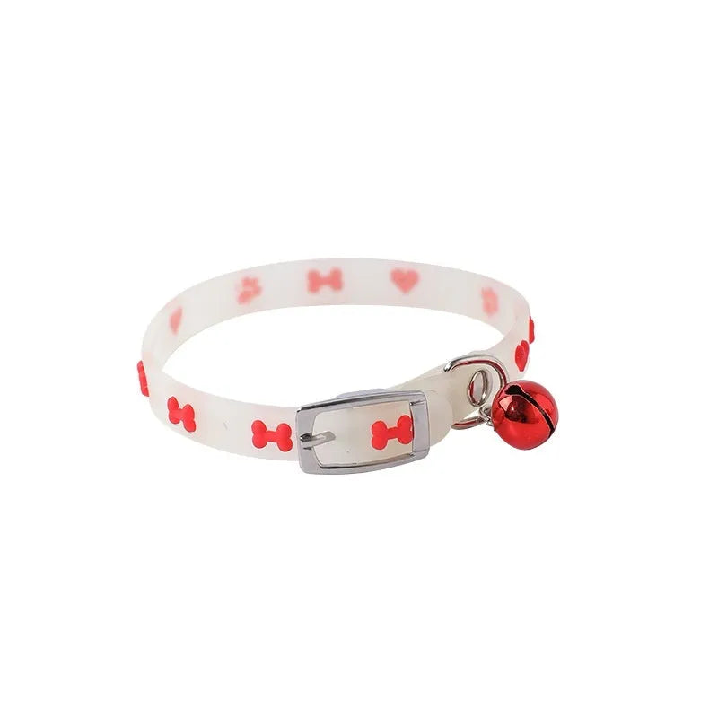 Meow Xinbao glow in the dark adjustable cat collar with metal bell on a silicone chain.