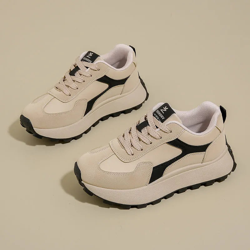 Women's low-top platform sneakers in Card Black with a flat rubber sole and front lace-up closure.
