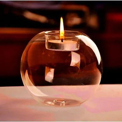 Round clear hollow glass candle holder for hot glass craft on a table