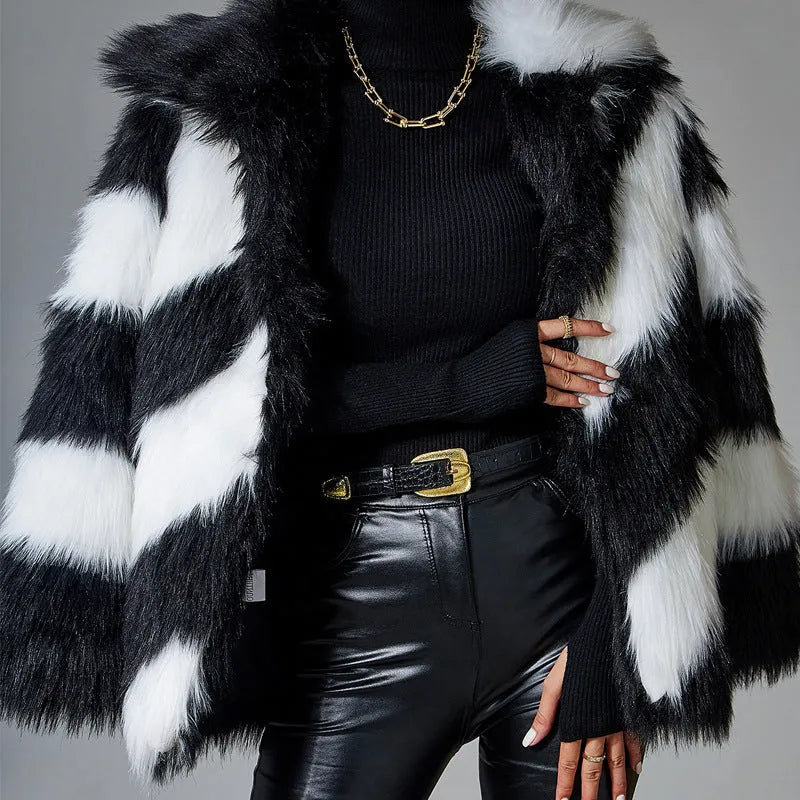 Women's faux fur coat with a contrasting colour lapel and a large fur collar.