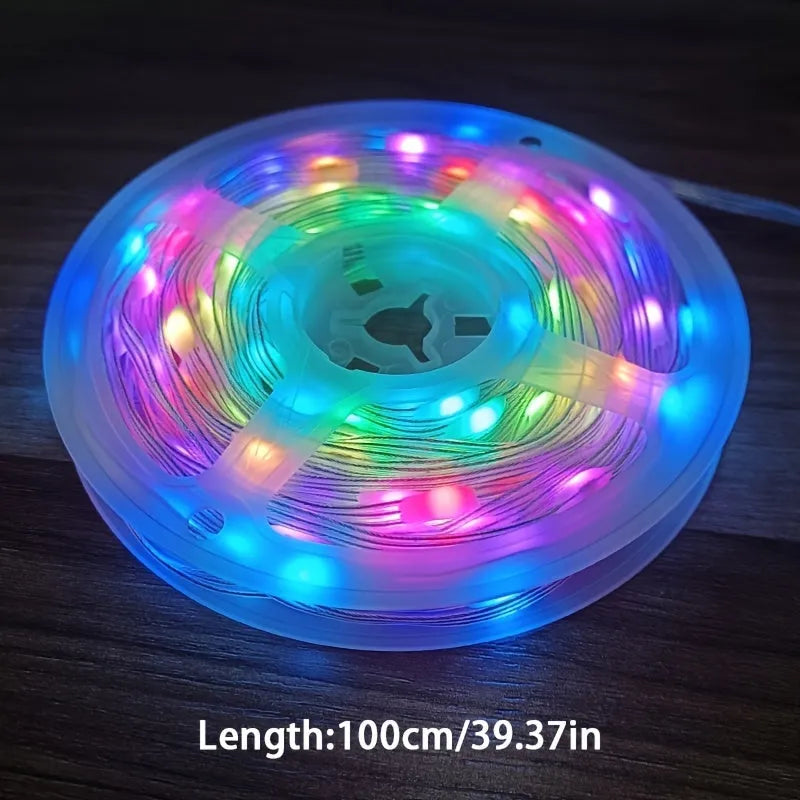Colourful LED light string with 100 bulbs on a 10-metre wire, showing battery pack and multiple mode settings.