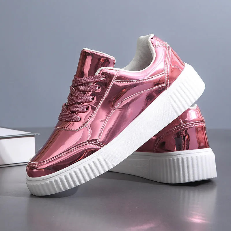 Sequin platform sneakers with thick sole in rose gold colour showing round toe and decorative stitching