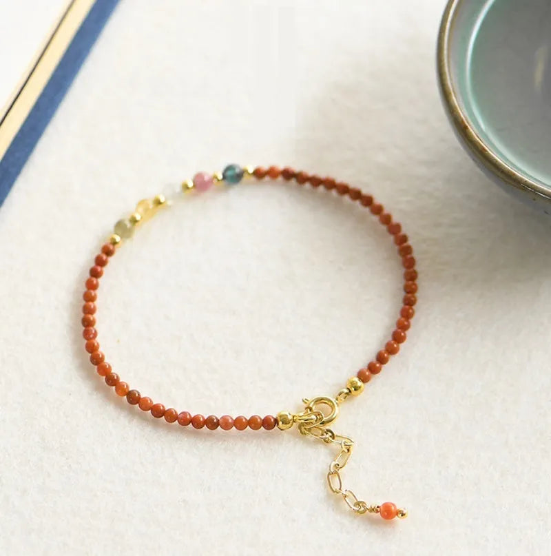Women's crystal freshwater pearl bracelet in amethyst braided rope style on a white background