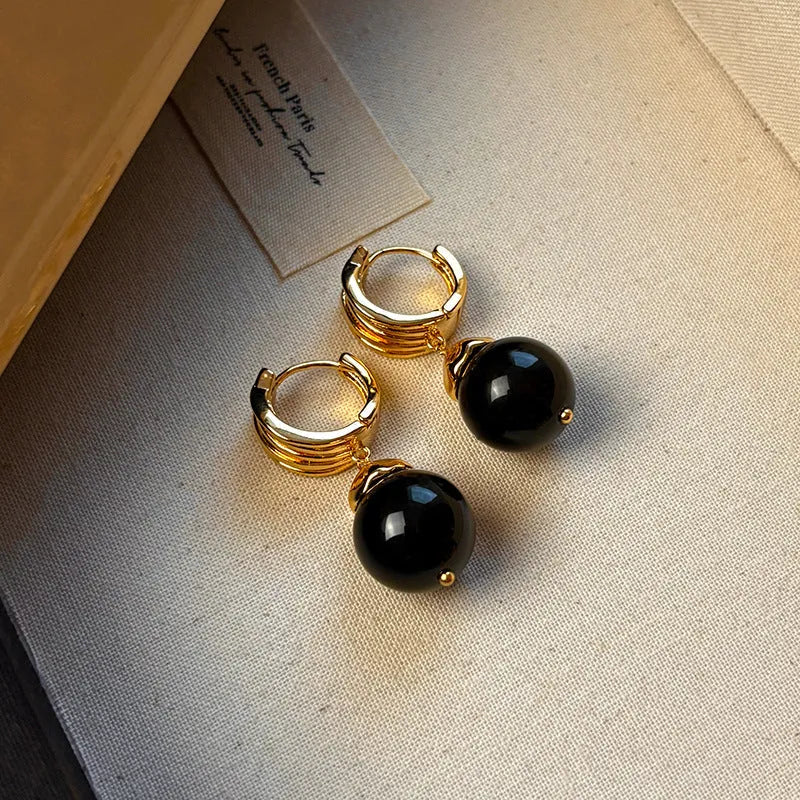 Gold plated geometric drop earrings with round brown tigereye stone, French retro style.