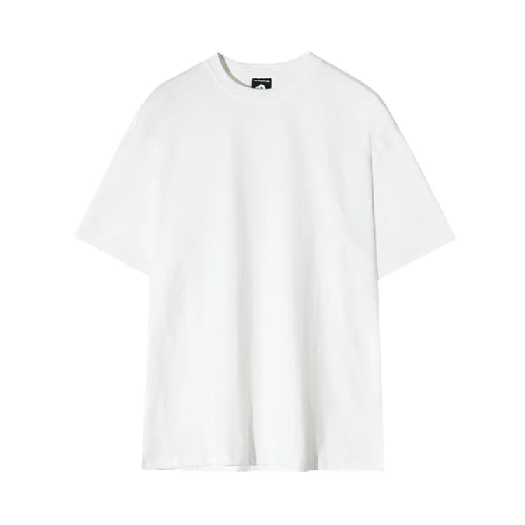 Men's slim fit cotton T-shirt in black on a hanger, showing round neck and regular sleeve.