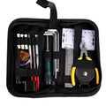 Black plastic guitar repair tool kit case open showing metal maintenance tools for guitar bass mandolin banjo