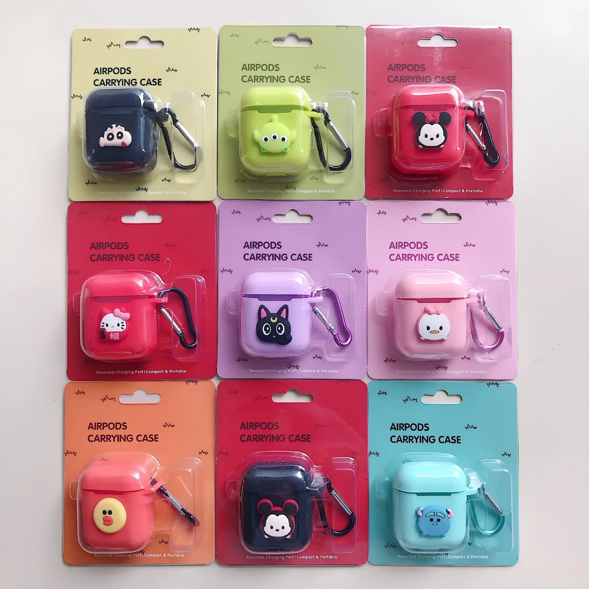 Silicone protective case for Bluetooth earphones with cartoon design and key-clasp hanging rope