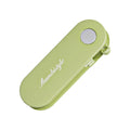 Foldable stainless steel vegetable peeler on white background, compact 91x36x18mm kitchen tool