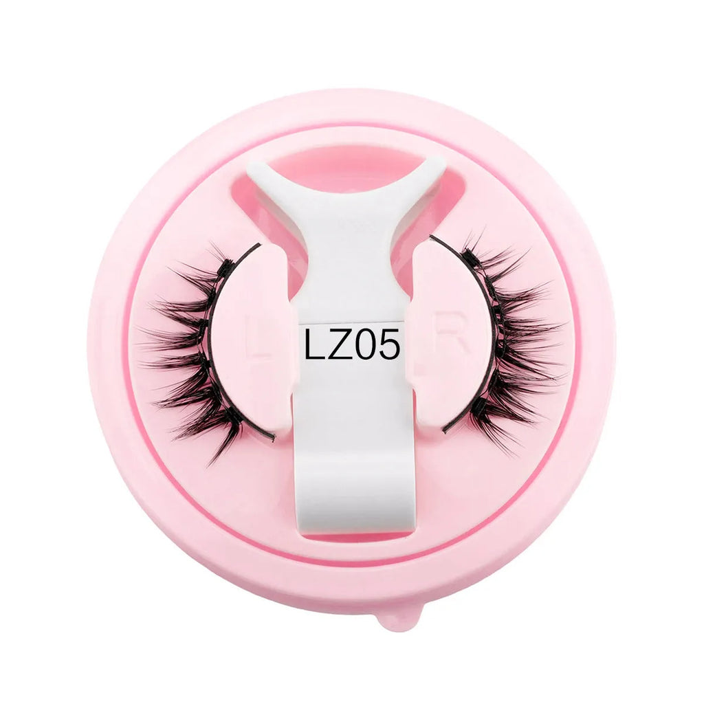 Set of reusable waterproof false eyelashes in five styles on a clear tray
