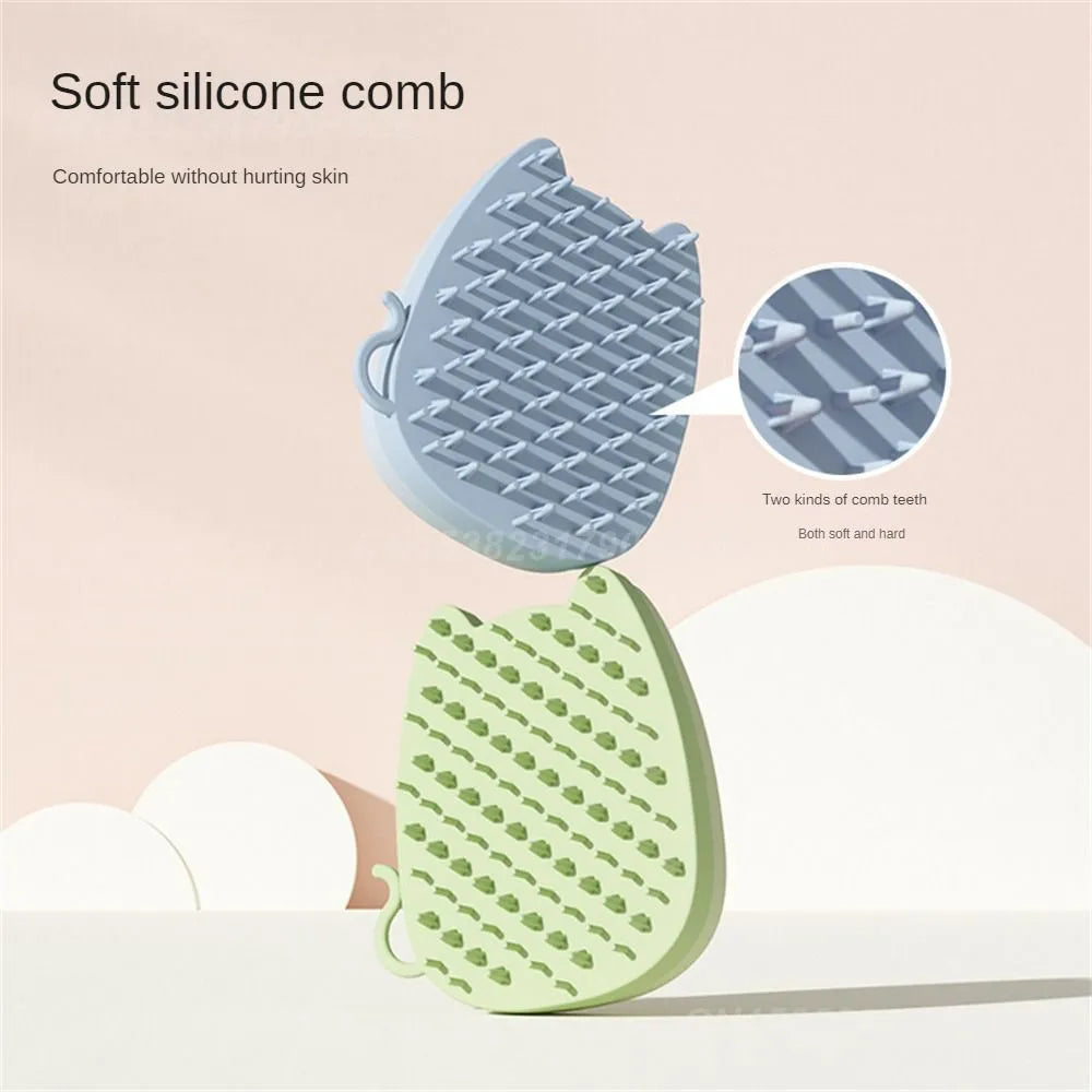 Blue silicone pet comb with sponge head for static adsorption of cat and dog hair.