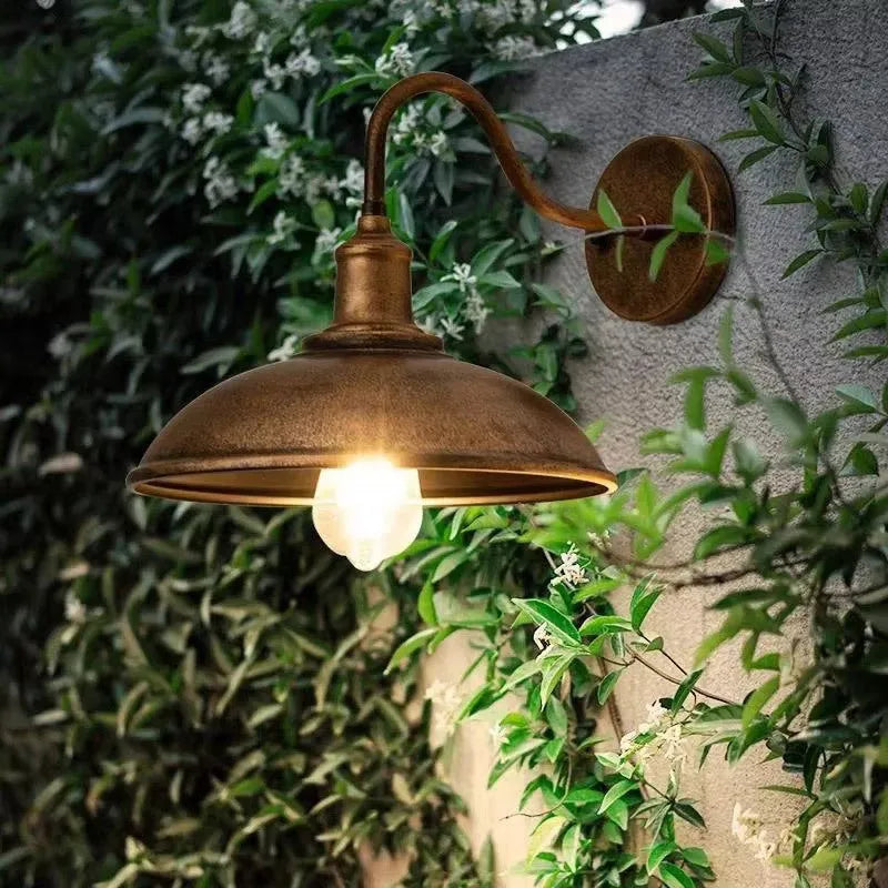 Retro-style metal wall lamp for a villa courtyard in a silver finish with right-angle mount.