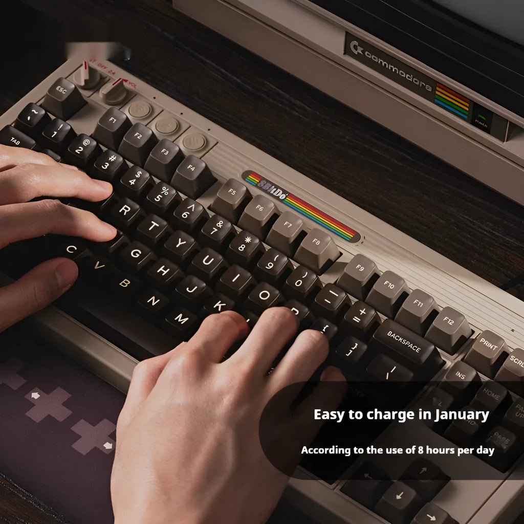 Retro87 C64 wireless Bluetooth mechanical gaming keyboard with rocker control on desk