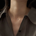 Oval geometric pendant necklace in S925 silver with gold or white gold plating on model