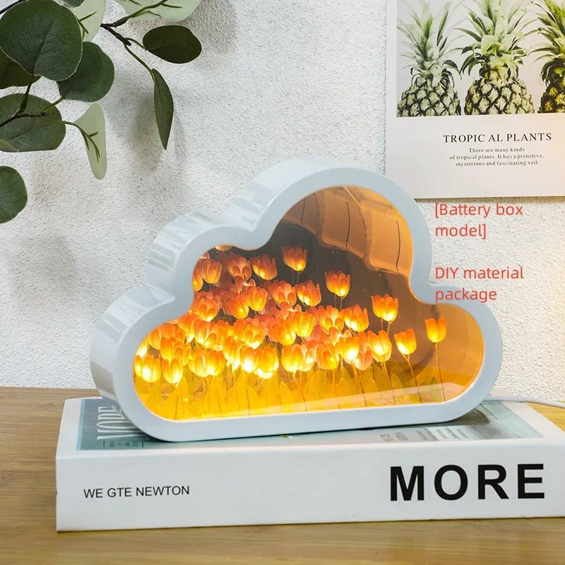 Tulip night lamp DIY kit with pink cloud tulip LEDs and mirror face on a desk