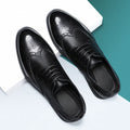 Men's black and brown brogue Oxford lace-up business shoes on a white background.