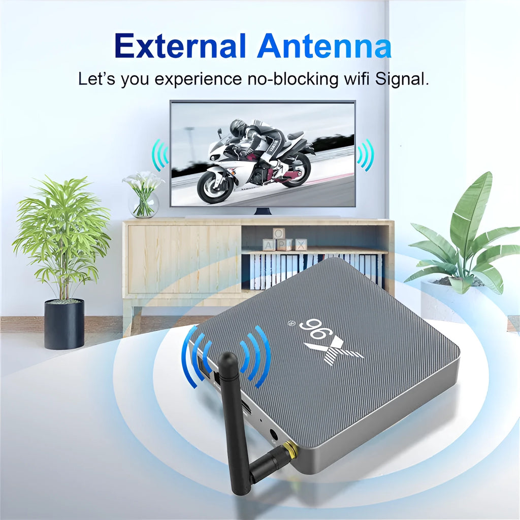 Android smart TV set-top box with remote control, HDMI cable, and power adapter on a table.