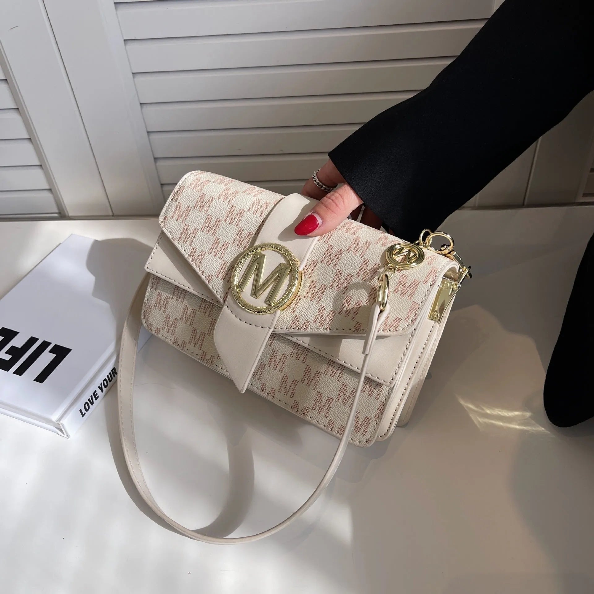 Niche personality printed letter shoulder messenger bag in beige with flap closure and single shoulder strap