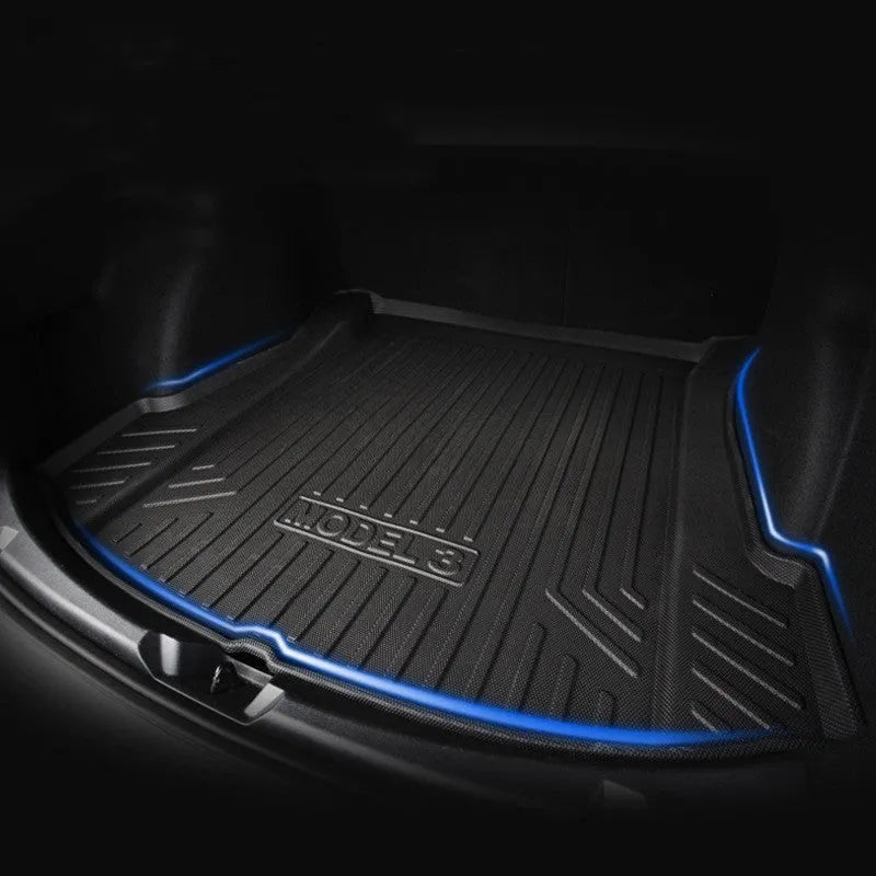 Set of black rubber floor mats for a Tesla car interior