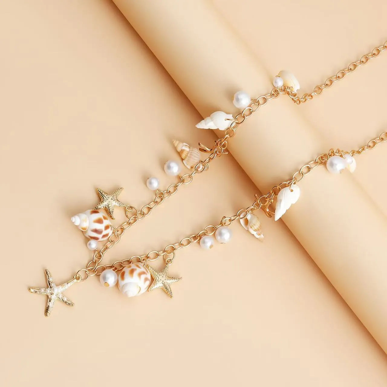 Women's alloy waist chain and bracelet set with star charms for summer beach fashion