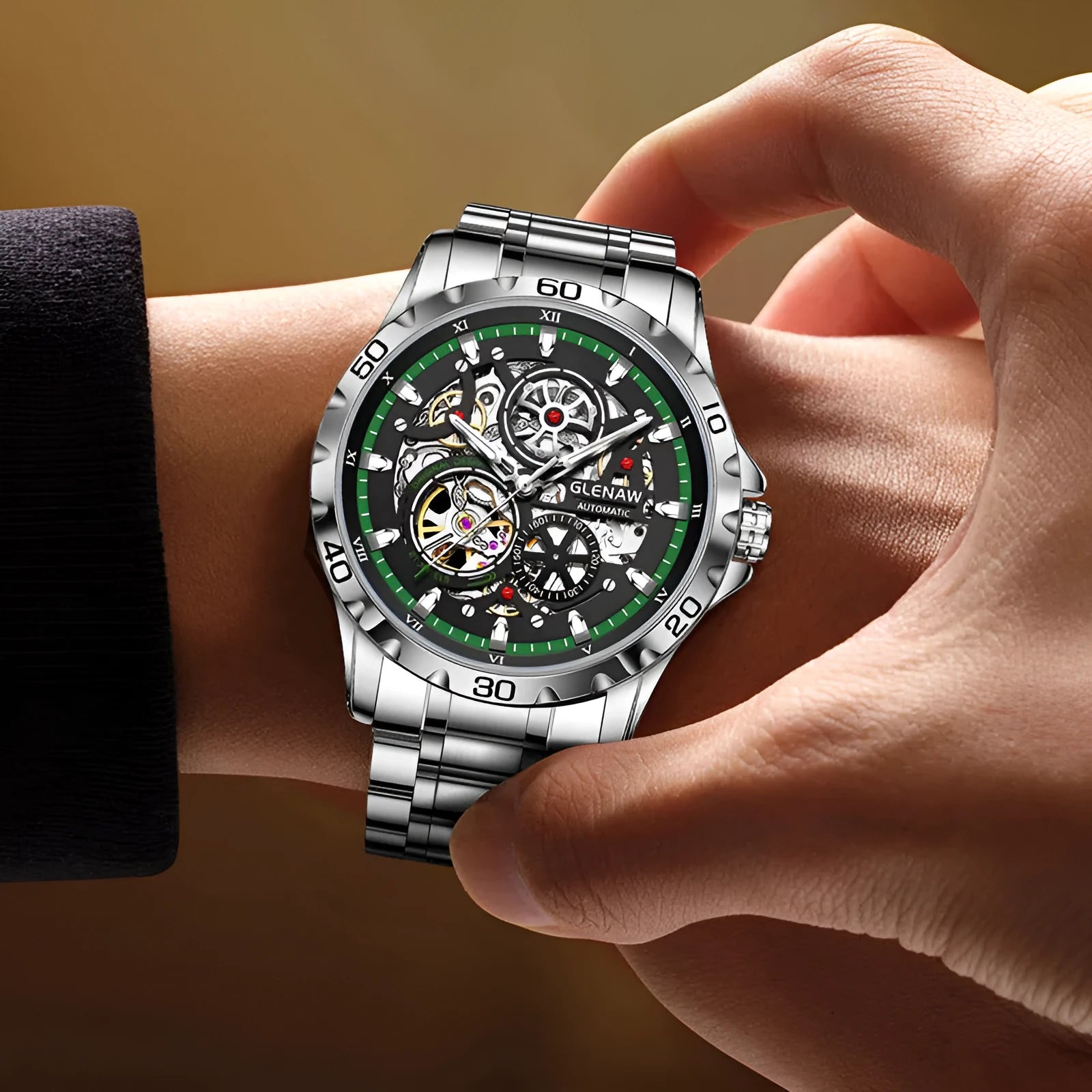 Men's silver mechanical watch with hollow-out dial showing movement and stainless steel strap