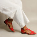 Red women's summer sandals with square buckle fastening and herringbone toe holder pattern