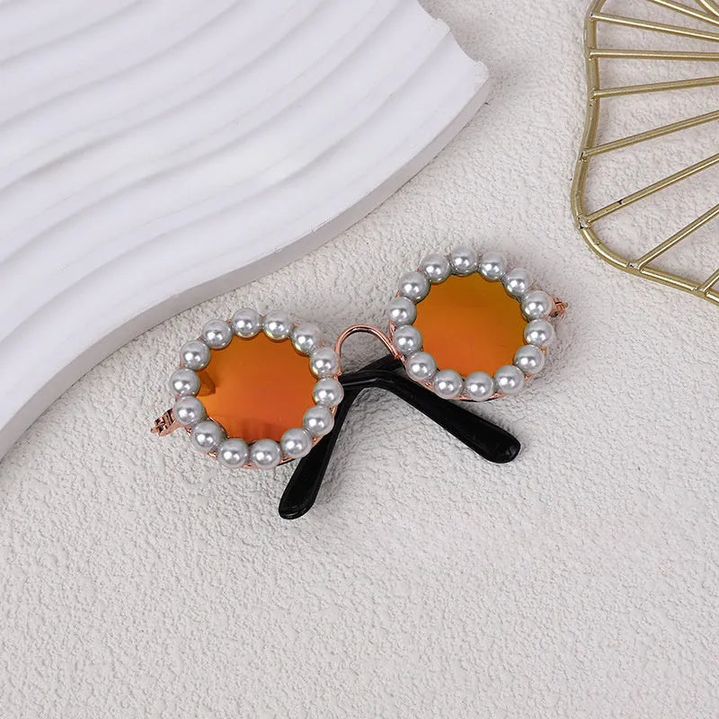 Cat and dog pearl-rimmed round sunglasses in multiple colours for pet party dress-up