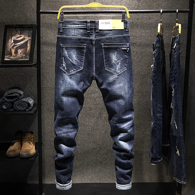 Man wearing dark blue skinny fit stretch denim jeans for casual wear