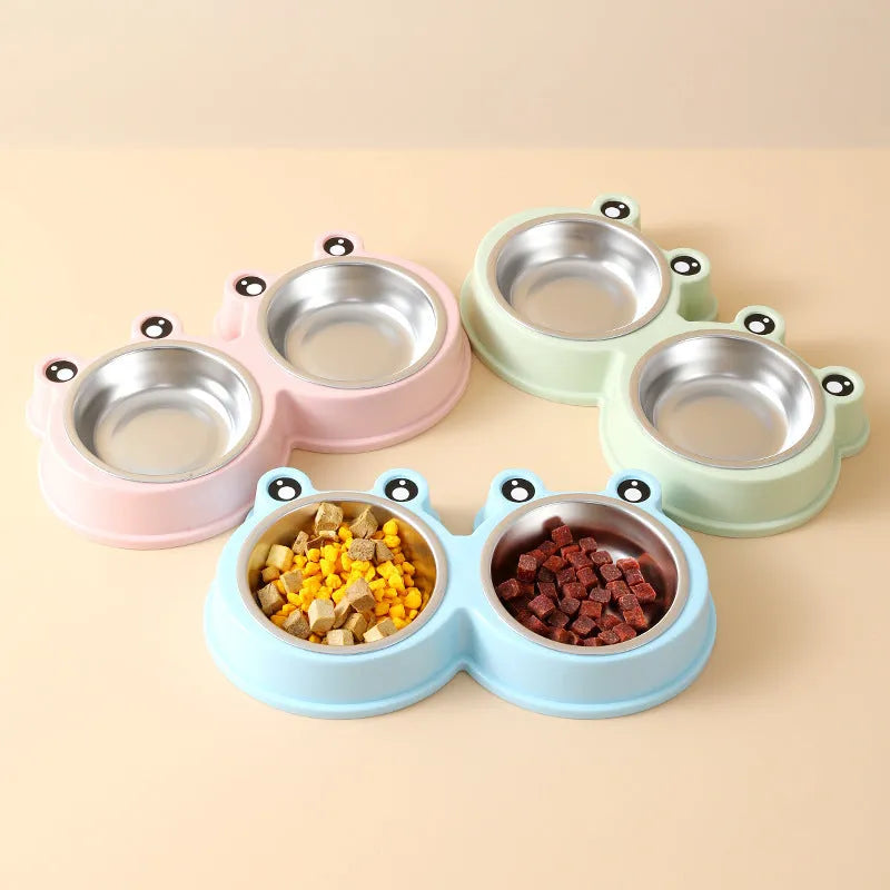 Blue double compartment pet feeding bowl with stainless steel frog-shaped water bowl attached.
