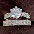 Geometric white gold colour wedding ring bracelet with round detail, shown in size options 5 to 11